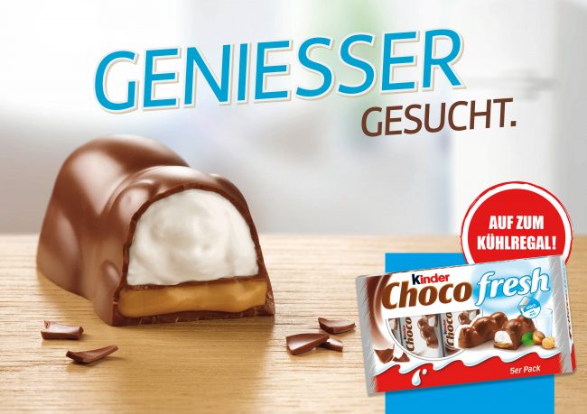 Ferrero Chocofresh chocolate bar with milkcreme nuts on wooden Underground refrigerator advertising billboard
