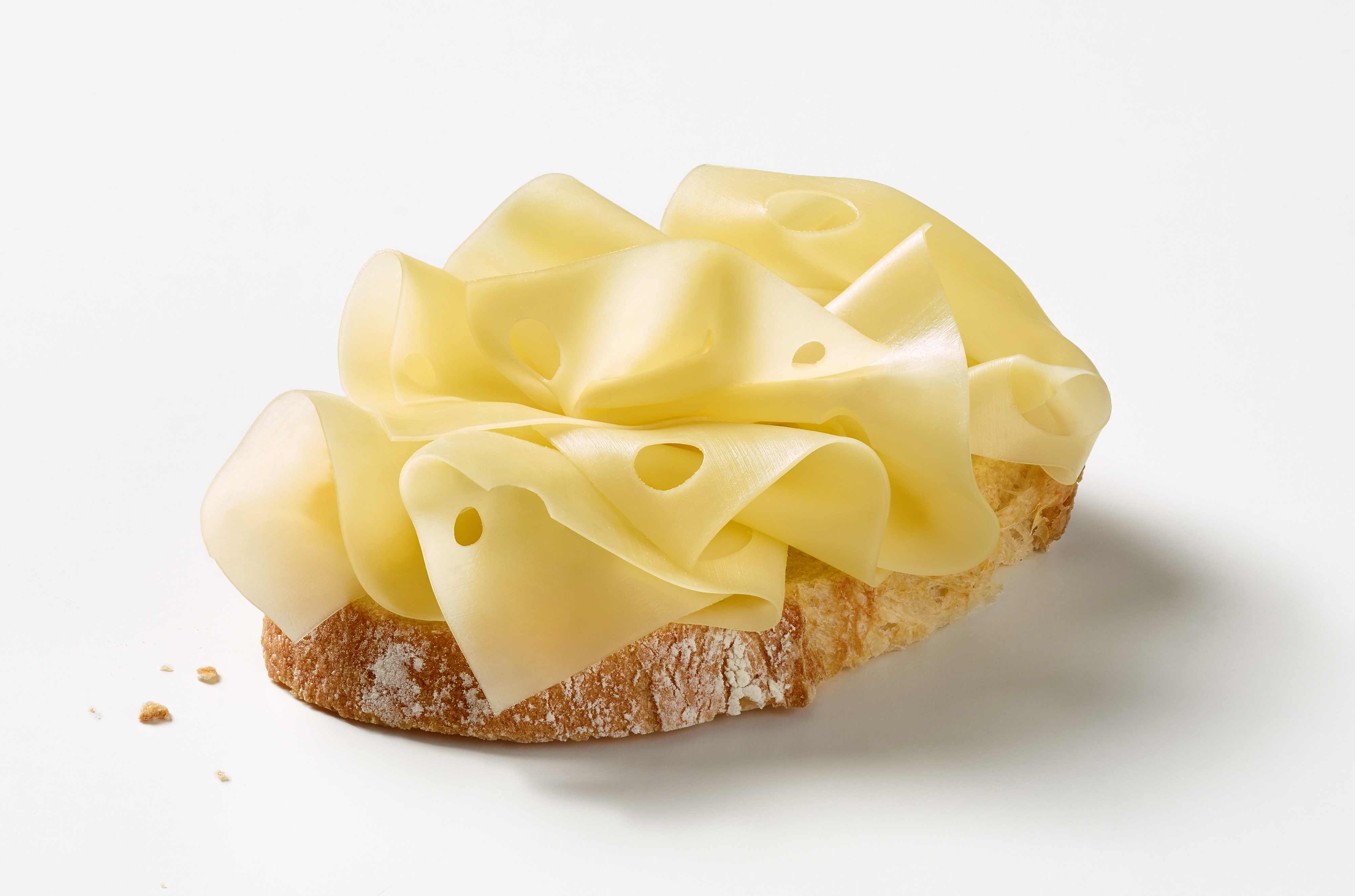several slices of Cheese on a bread