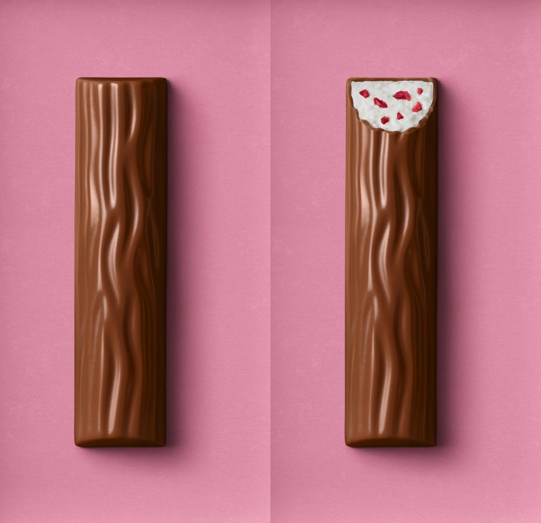 Packaging relaunch for the Yoguretten packaging. A bitten strawberry chocolate bar and an unbitten strawberry chocolate bar lie on a pink background