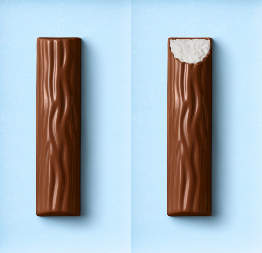 Packaging-Relaunch für die Yoguretten Verpackung. ein angebissener Yogurt Sensation Schokoladenriegel und ein unangebissener weisser Schokoladenriegel liegen auf einem blauen Untergrund