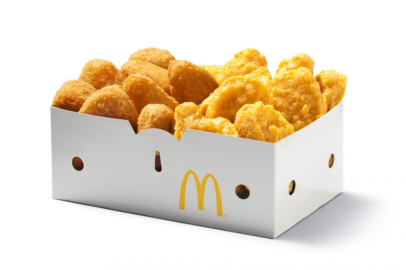 Promotion Mc Donald's Oktoberfest 2019, a fan box with Chicken Mc Nuggets and cheese peaks lies on a white background.